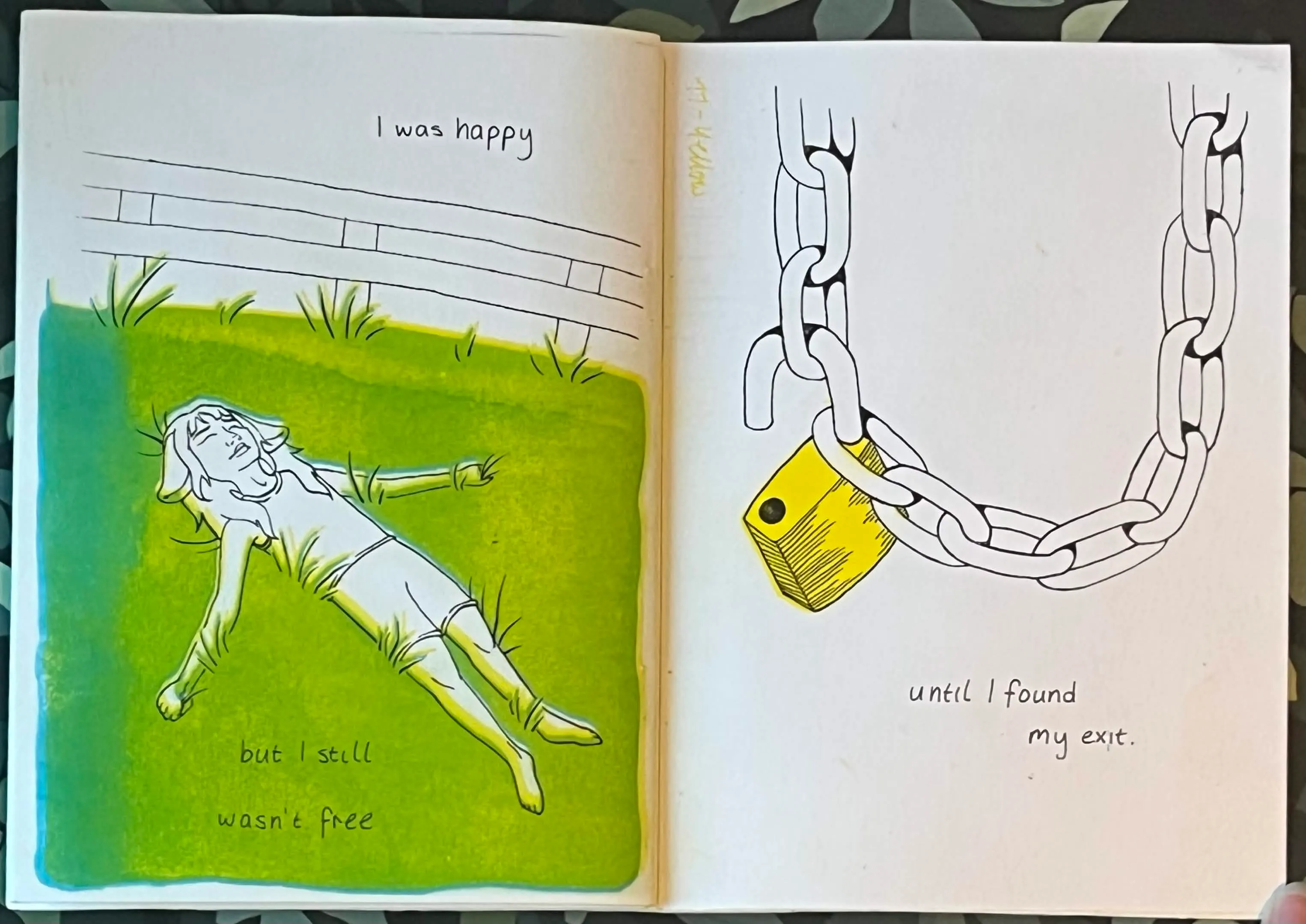 Pages 11 and 12 Black Sheep, showing sheep girl lying down a bright green field with text 'I was happy, but I still wasn't free' on the first page. And an unlocked padlock on a chain with text 'Until I found my exit' on the second page
